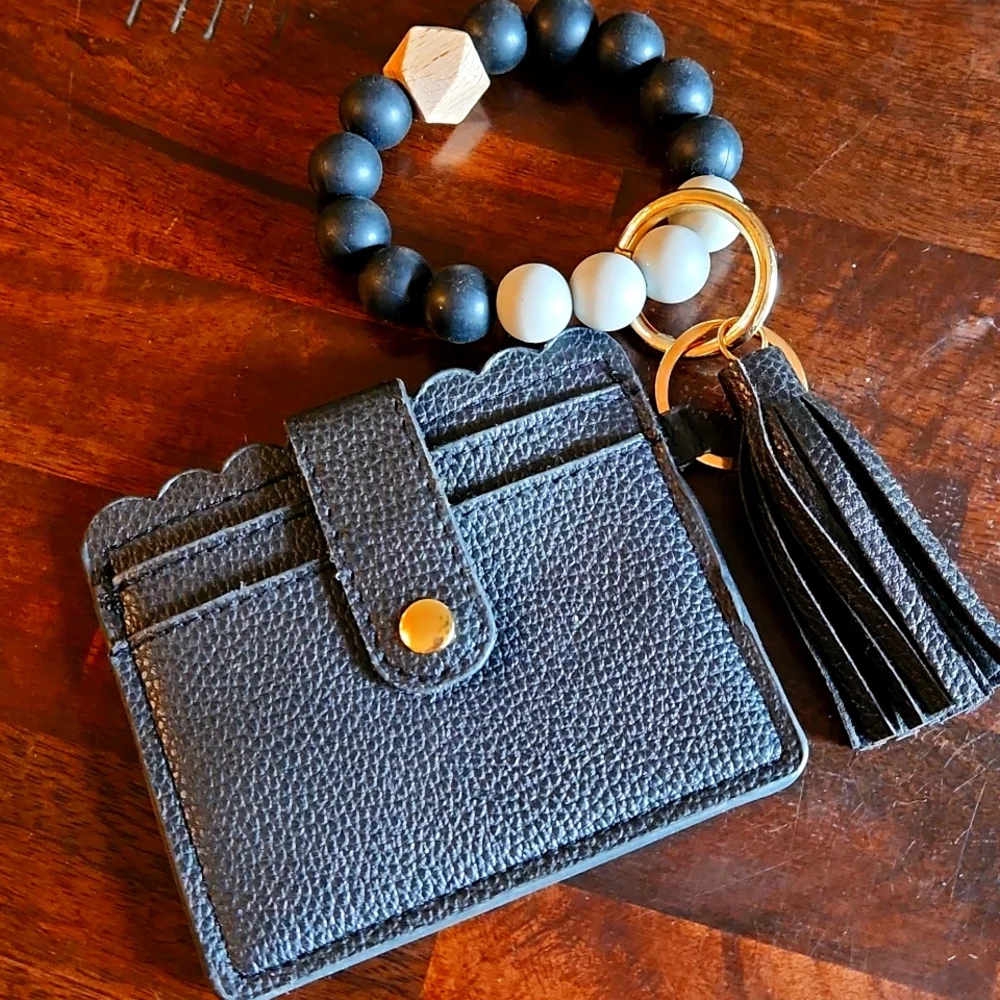 Black wristlet wallet key chain with rubber & wooden beads and tassel - Picture 1 of 7